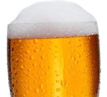 a glass of foamy beer