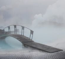 This is a bridge over the beautiful blue nutrient rich geothermal water of the Blue Lagoon in Iceland