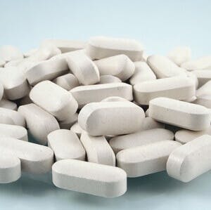 a large pile of calcium pills 3D illustration