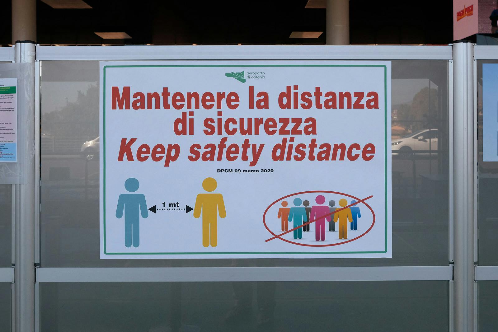 Catania, Italy &#8211; March 12, 2020: Coronavirus in Italy. Quarantine announcement about one meter distance between people as prevention mesure against Covid-19 virus epidemic in Italy
