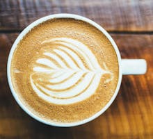 latte in a cup with foam art