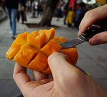 cutting up a mango
