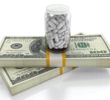 hundred dollar bills with pills