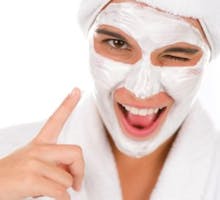 Woman with facial mask of milk of magnesia