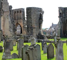 Gravestones in a ruined church graveyard
