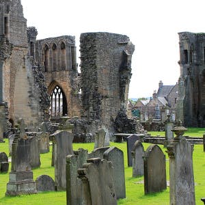 Gravestones in a ruined church graveyard