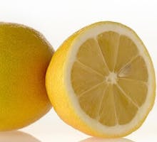 two lemons, one is cut