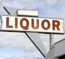 A liquor store sign in the 1950's style.
