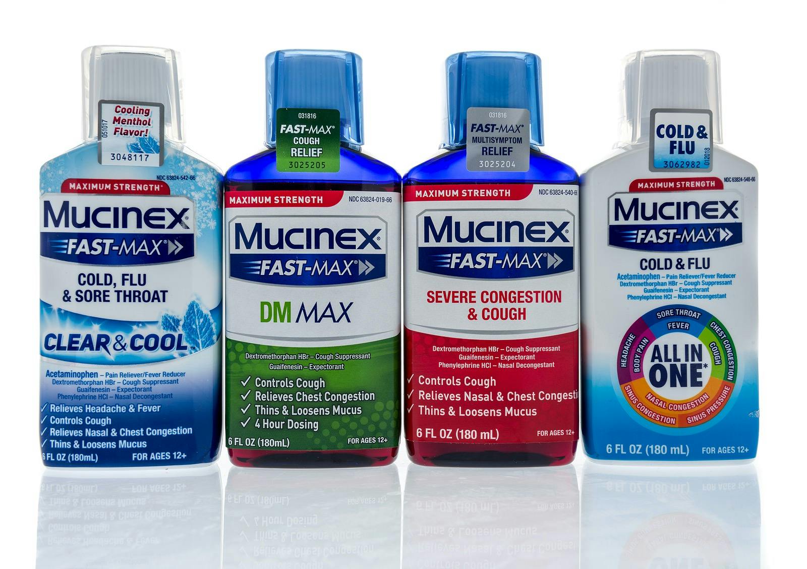 Winneconne, WI &#8211;  5 May 2019 : A package of a Mucinex fast max cold, flue, sore throat, DM max severe, congestion, and cough bottles on an isolated background
