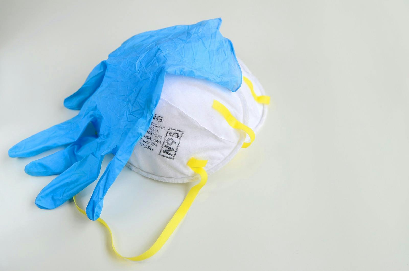 Avoid COVID-19 with N-95 mask with surgical glove