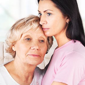 senior woman with her adult daughter