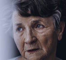 Senior woman with Parkinson's