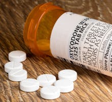 Oxycodone tablets and pill bottle