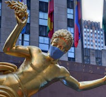 Statue at Rockefeller Center wears mask to remind New Yorkers to wear theirs