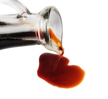 Soy sauce being poured
