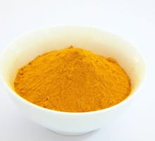 bowl of turmeric spice