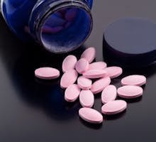 Vitamin B12 Dietary Supplement Pills Spilt From Container