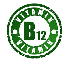Green round rubber stamp with vitamin B12 text