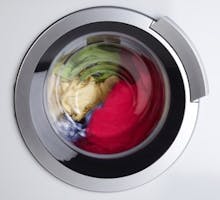 laundry spinning in a front loading washing machine