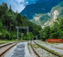 Scenic train tracks in alpine landscape